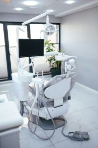 dentist chair in a bright, clean dental clinic room