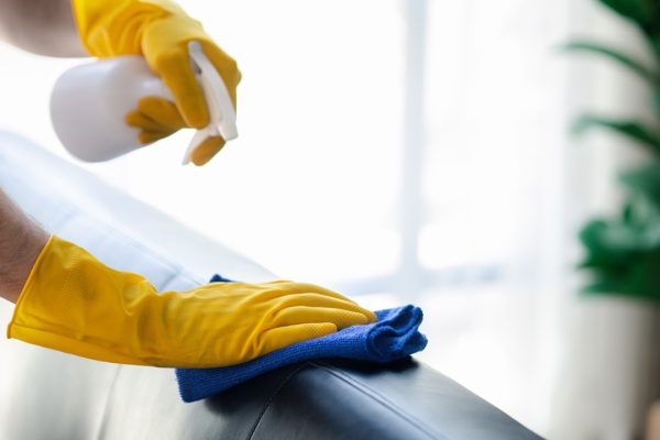 commercial cleaning staff disinfecting a surface